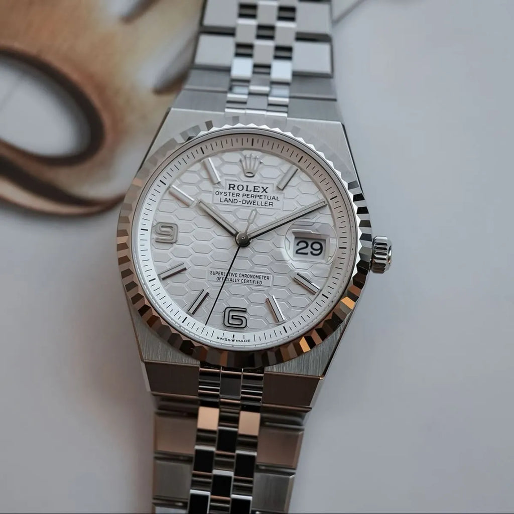 Montre Rolex Land-Dweller pour homme, cadran blanc argenté à motif nid d'abeille