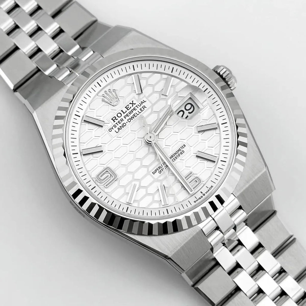 Montre Rolex Land-Dweller pour homme, cadran blanc argenté à motif nid d'abeille