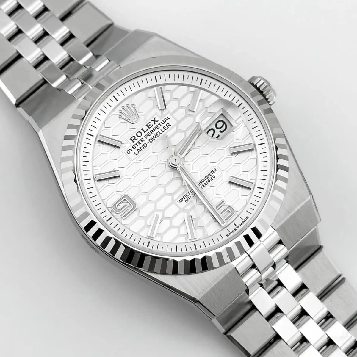Montre Rolex Land-Dweller pour homme, cadran blanc argenté à motif nid d'abeille